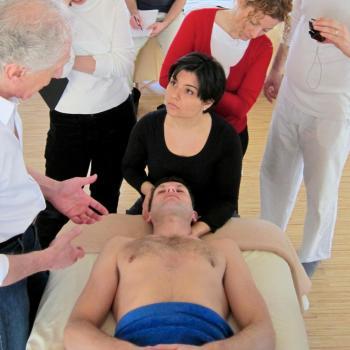 Honoring Harvey Burns Harvey Burns in class demonstrating a Rolfing technique to students