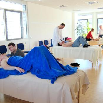 Honoring Harvey Burns Harvey Burns in class demonstrating a Rolfing technique to students